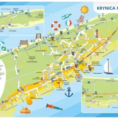 Mapa Krynicy Morskiej z zaznaczonymi atrakcjami, plażami, ścieżkami rowerowymi i drogami. Widać tu m.in. porty, latarnię morską i plac zabaw.