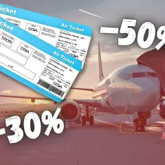 Tanie loty w styczniu! Bilety lotnicze z rabatem -30% i -50%. Samolot przy rękawie, słońce zachodzi.