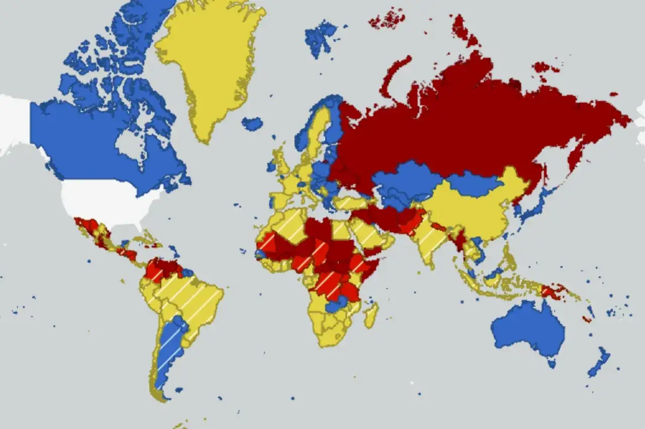 Mapa świata z zaznaczonymi kolorami krajami, wskazująca na najniebezpieczniejsze kraje świata. Czerwone obszary oznaczają wysokie ryzyko.